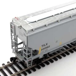 Walthers Proto 920-105864 HO Scale 67' Trinity 6351 4 Bay Hopper Trinity Leasing TILX 640683 -Lionel Store walthers proto 920 105864 ho scale 67 trinity 6351 4 bay hopper trinity leasing tilx 640683 3